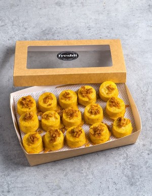 Box de 15 unidades de mini pastelitos de tortilla de patatas y cristal de cebolla.